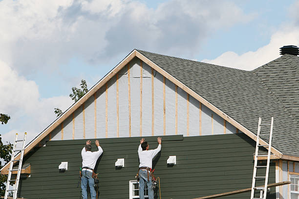 Professional Siding Contractor technician working in Bradenville, PA